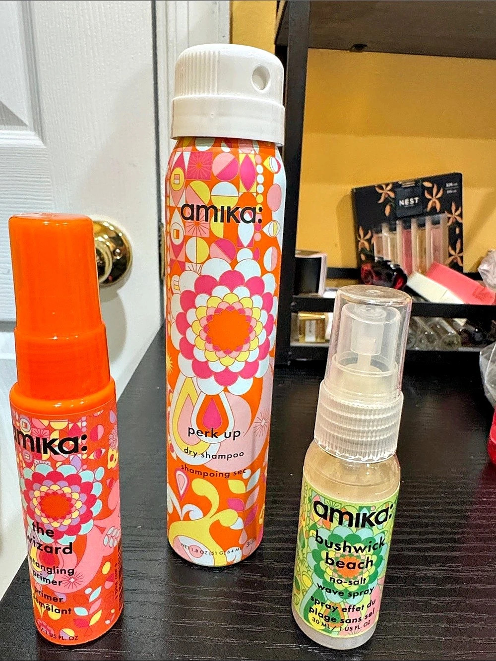 amika: the wizard detangling primer, perk up , bushwick beach no-salt hair set